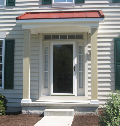 new portico overhang with red metal roof