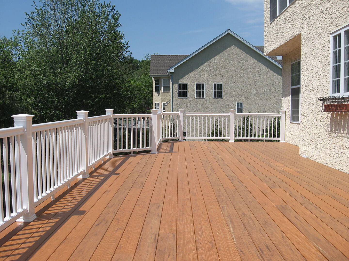 wooden second story timbertech attached deck
