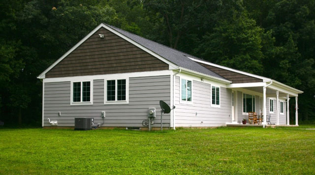 side view of vinyl siding one story home