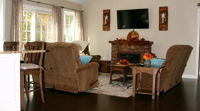 newly renovated living room with hardwood floors