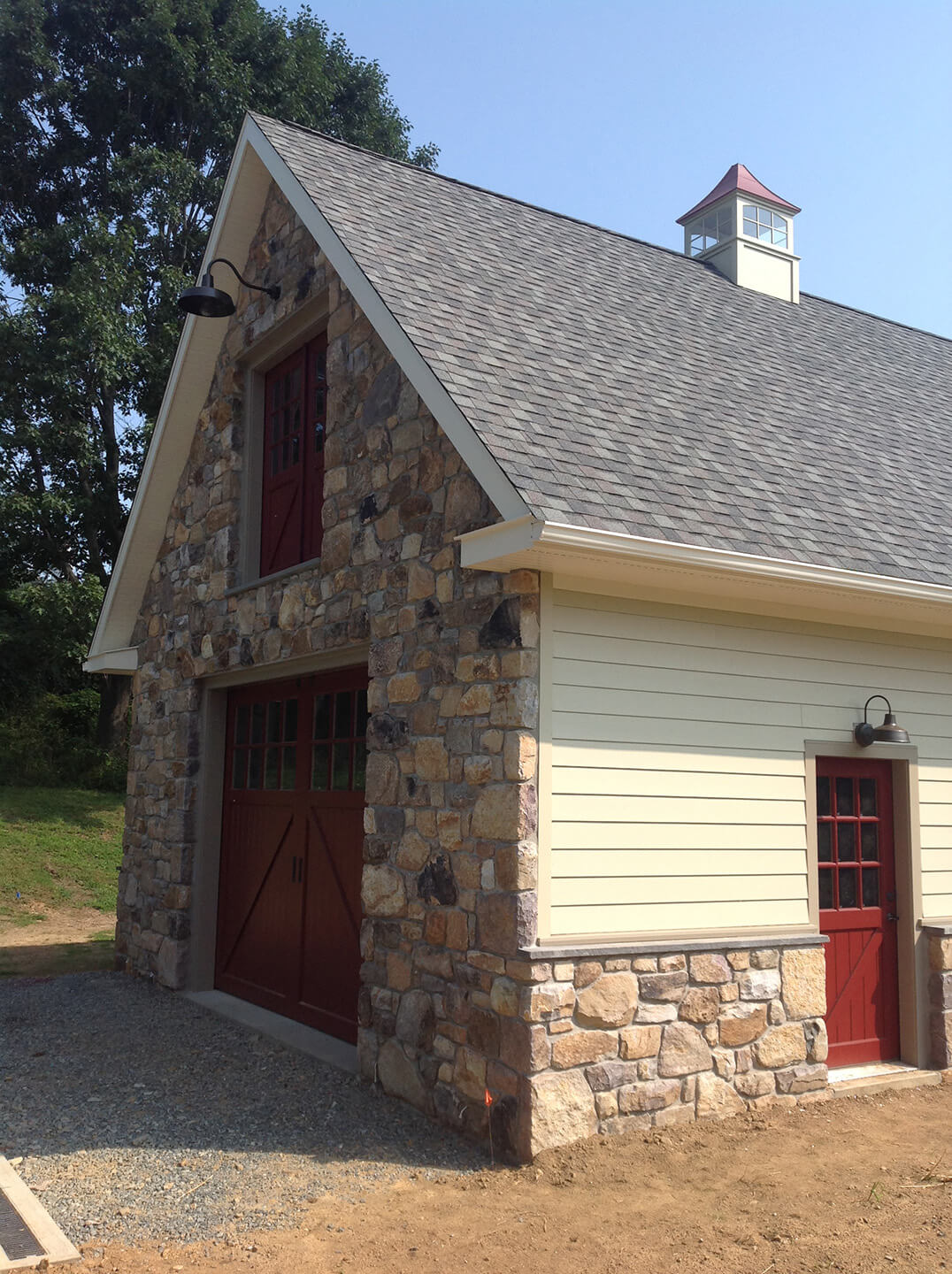 side view of custom garage with James Hardie siding