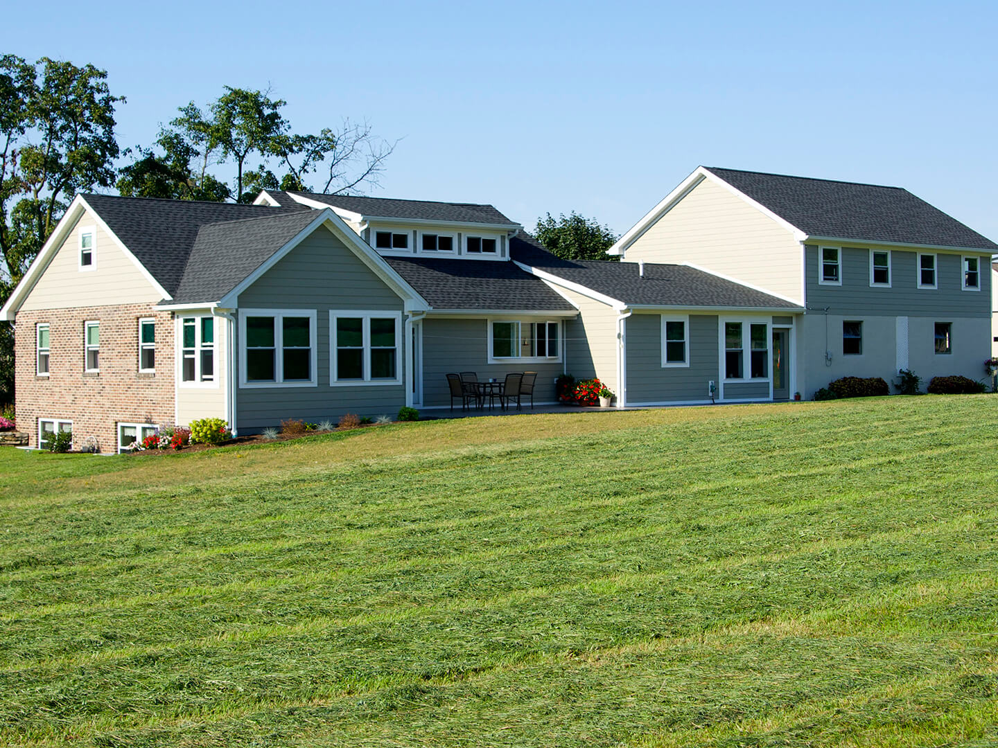 after photo of completed house renovation with fiber cement siding