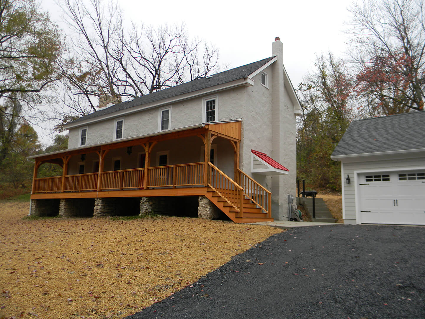 photo after completed home and garage renovation on historic farmhouse in brandywine, pa