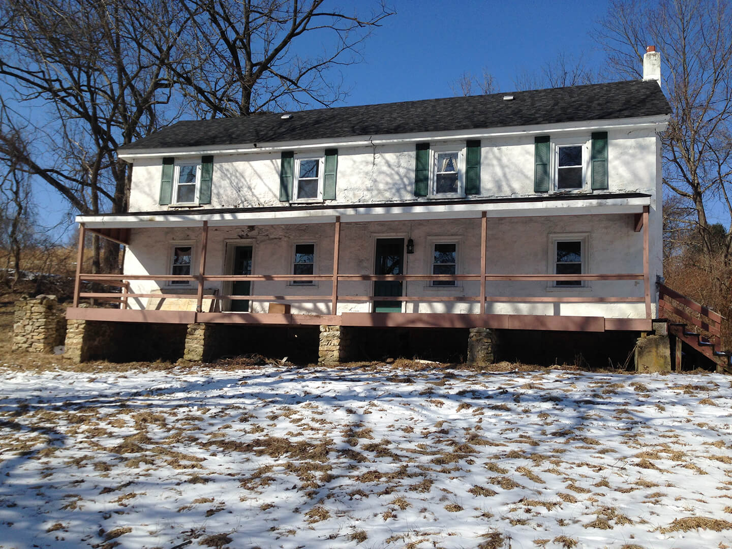 historic two story farm house before house renovation