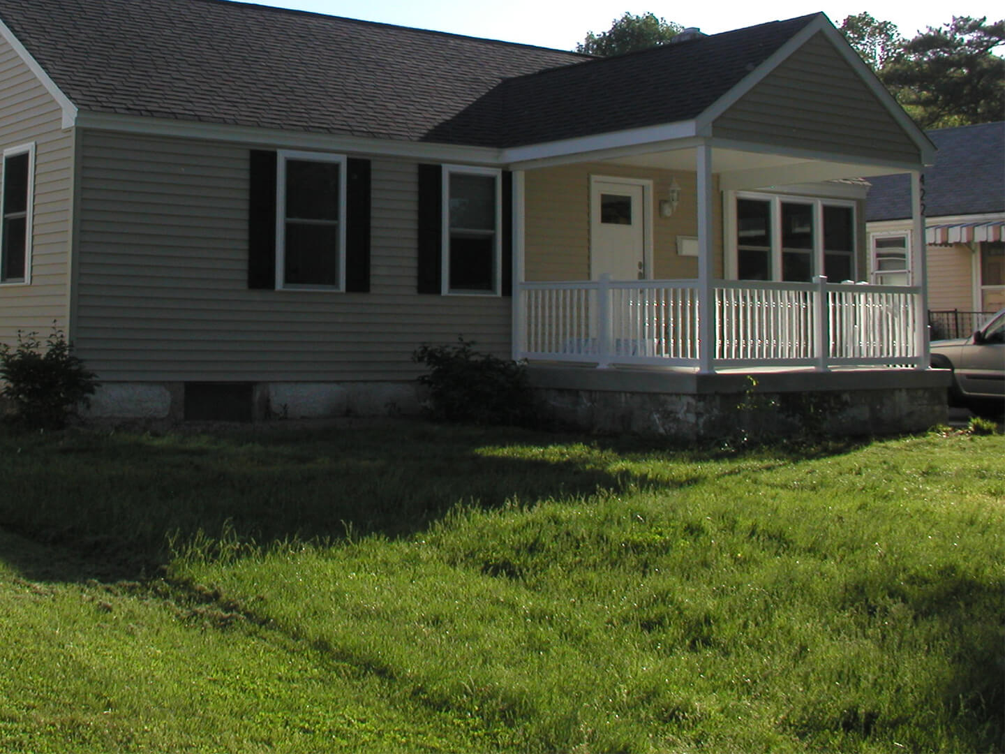 one story house after covered porch addition was completed