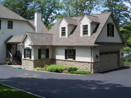 large cape cod custom home garage